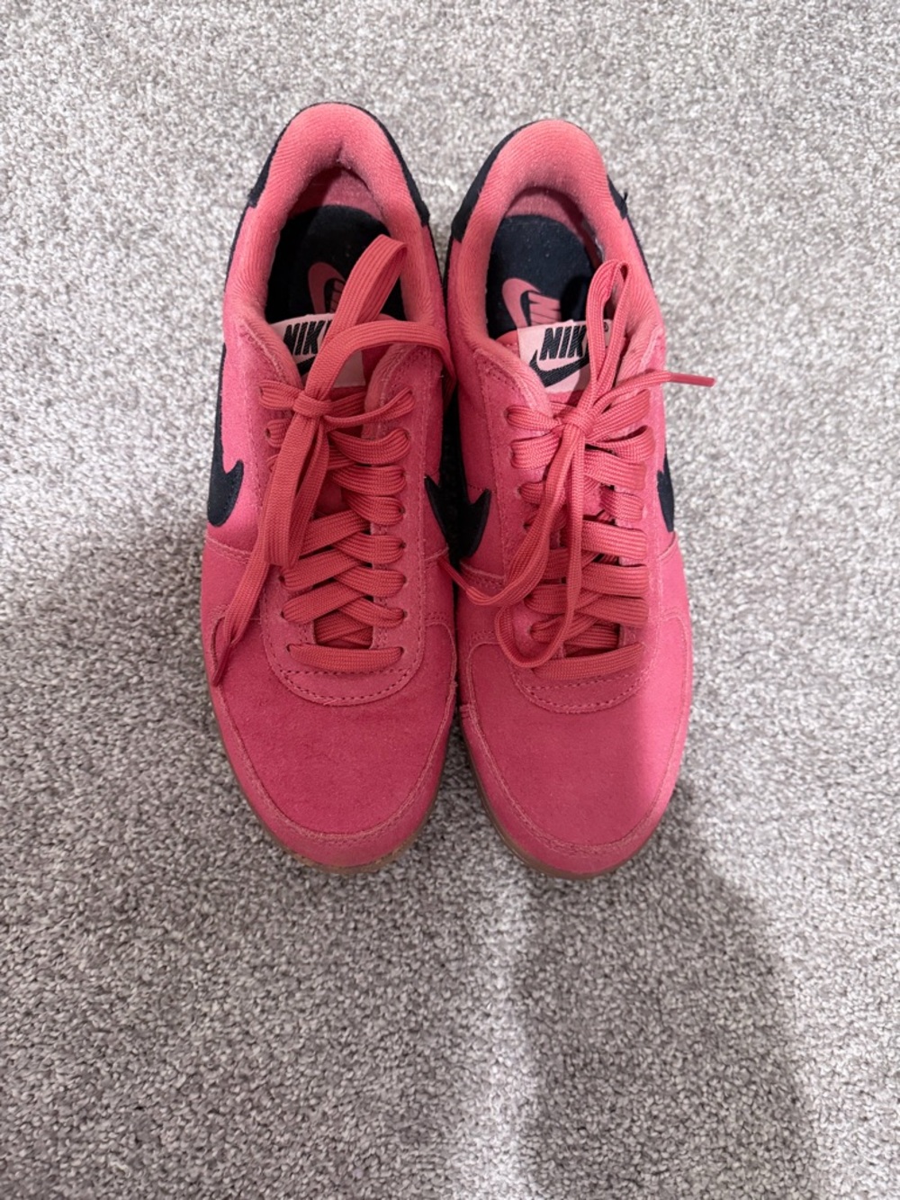 Nike Coral Pink Low-Top Sneakers with Black Swoosh